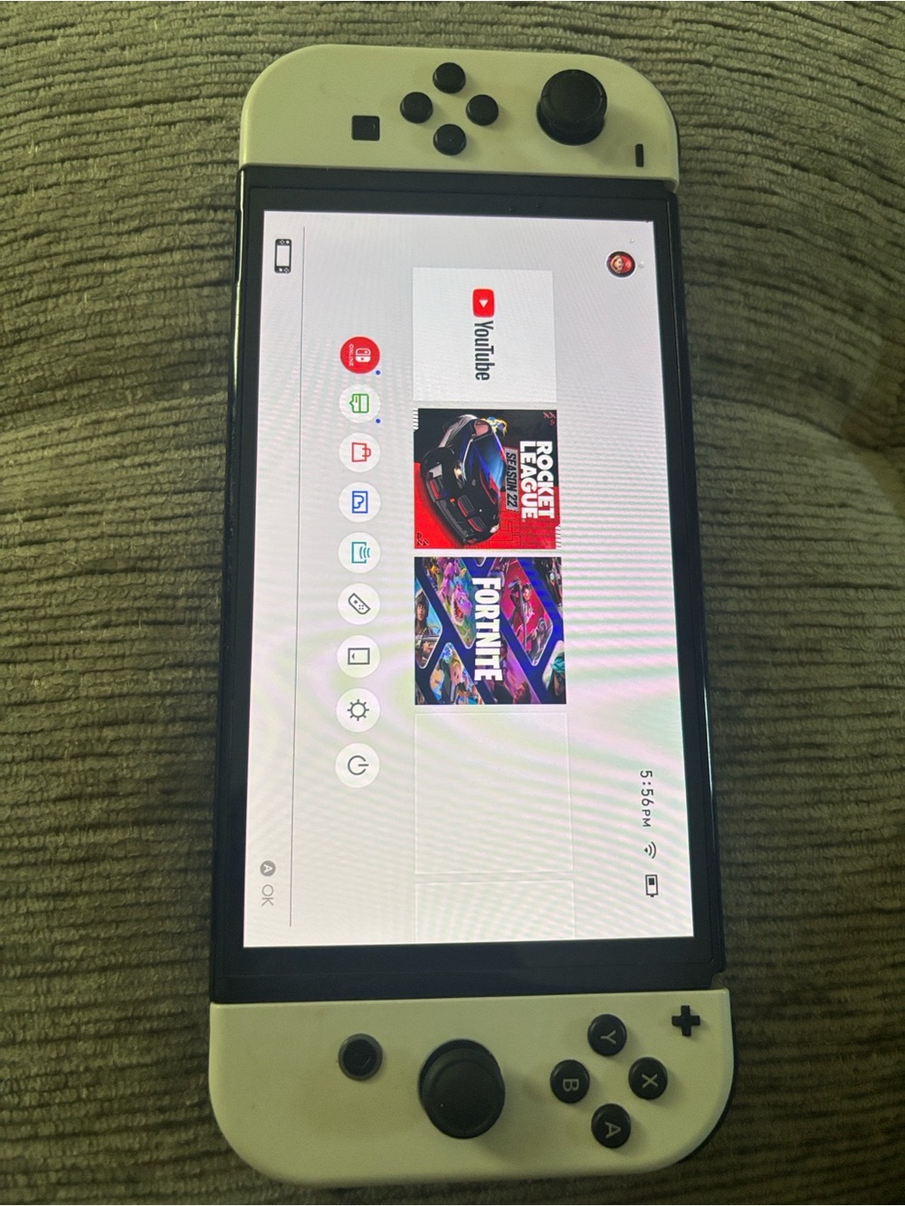 Nintendo Switch with White Joy‑Con Controllers